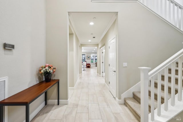 corridor with crown molding