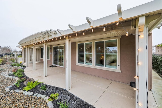 rear view of property with a patio area