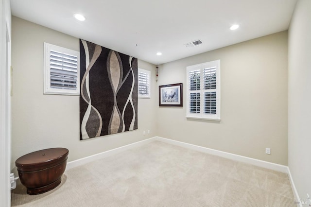 view of carpeted spare room