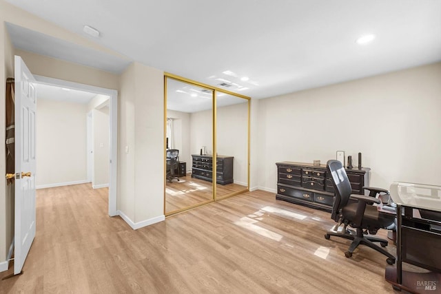 office area with light hardwood / wood-style flooring