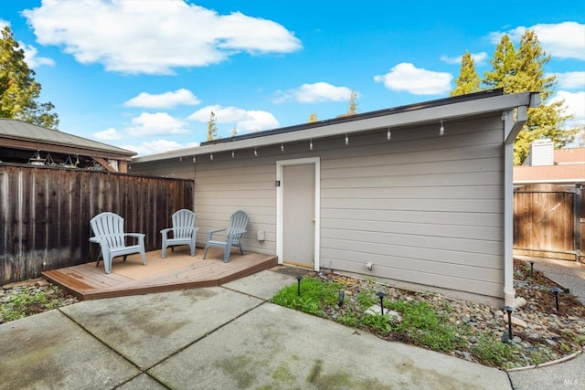 exterior space with a patio and a deck