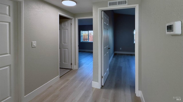 hall featuring light hardwood / wood-style flooring