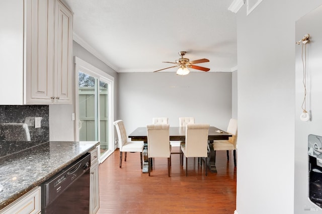 dining room with ornamental molding, hardwood / wood-style floors, and ceiling fan