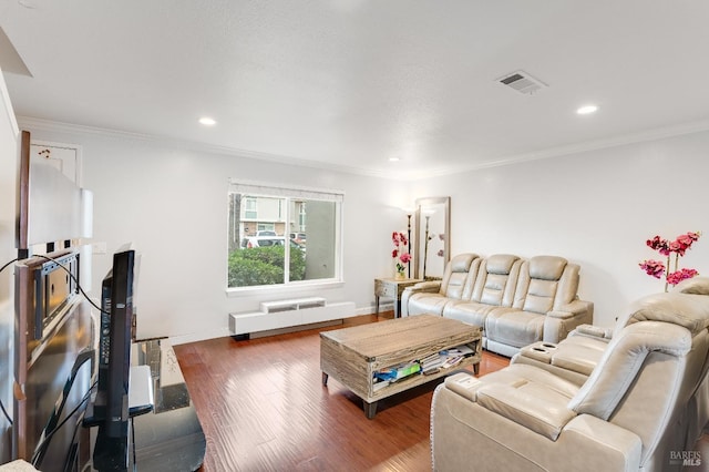 living room featuring ornamental molding and wood-type flooring