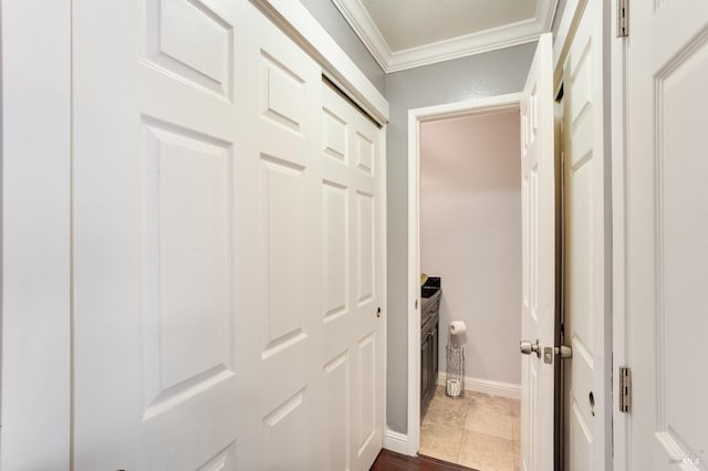 hallway featuring crown molding