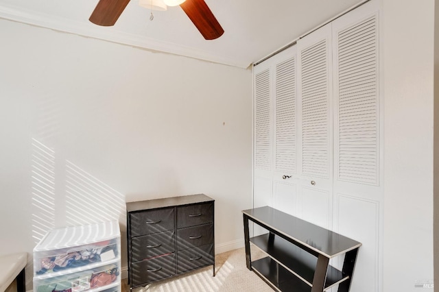 interior space featuring ceiling fan