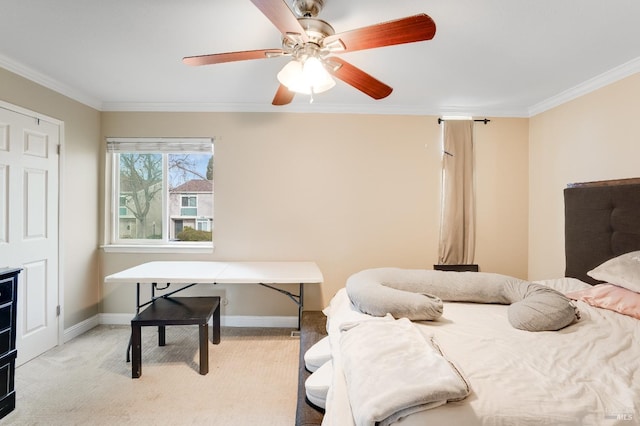 bedroom with light carpet, crown molding, and ceiling fan