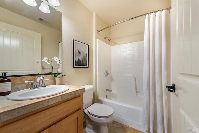 full bathroom featuring tile patterned flooring, vanity, shower / bath combo with shower curtain, and toilet