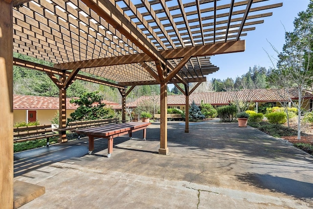 exterior space with a pergola