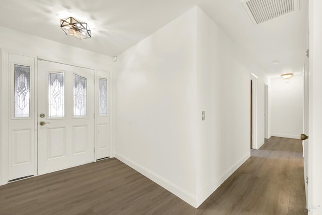 entrance foyer with dark hardwood / wood-style flooring