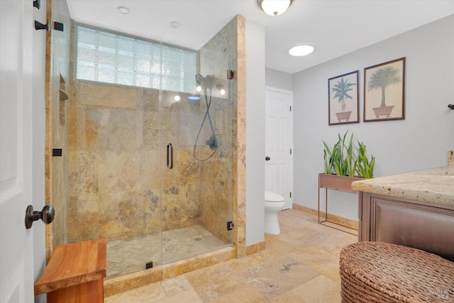 bathroom featuring walk in shower and toilet