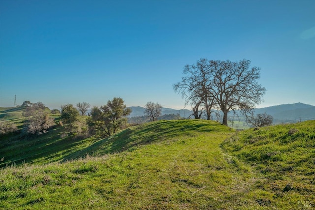 exterior space with a mountain view and a rural view