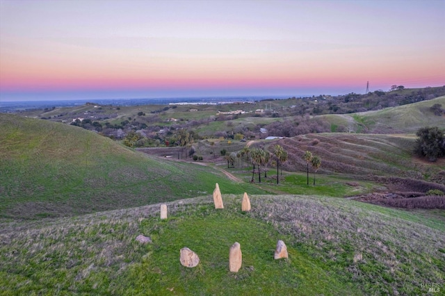 aerial view at dusk with a rural view