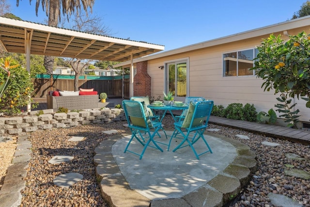 view of patio / terrace with fence and outdoor dining area