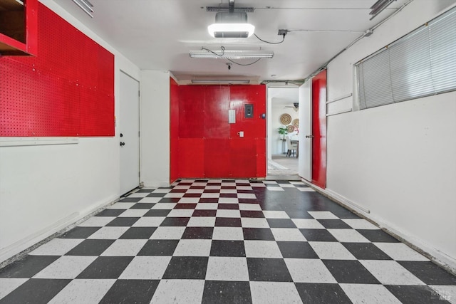 hall with tile patterned floors