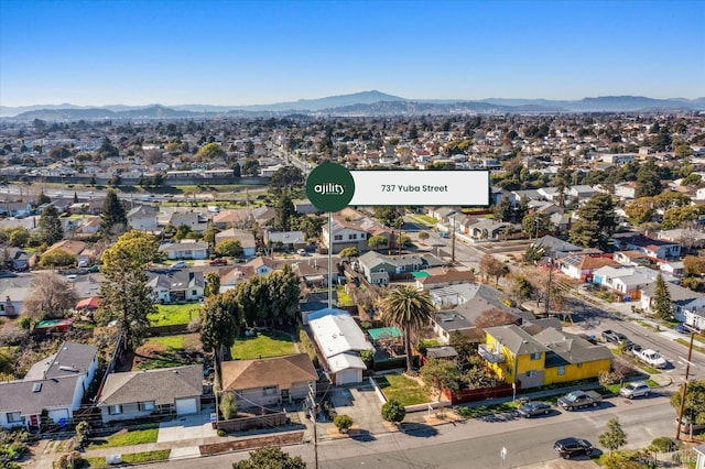 aerial view with a residential view and a mountain view