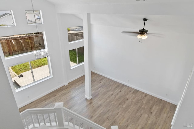 spare room featuring ceiling fan and light hardwood / wood-style floors