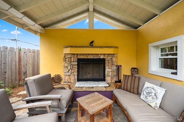 view of patio featuring an outdoor stone fireplace