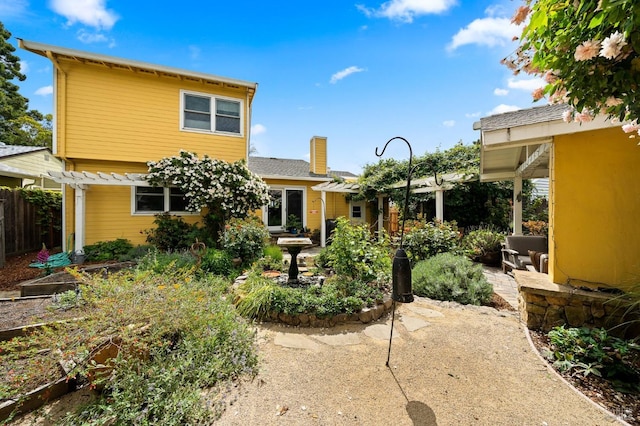 back of house with a patio area