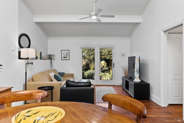 living room featuring vaulted ceiling with beams, dark hardwood / wood-style floors, and ceiling fan