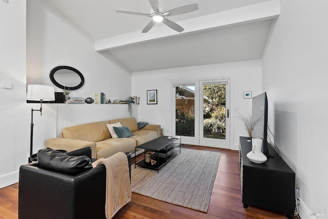 living room featuring ceiling fan, dark hardwood / wood-style flooring, and vaulted ceiling with beams