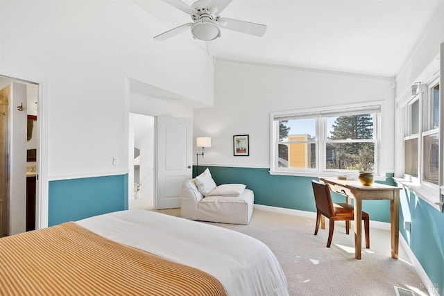 bedroom featuring vaulted ceiling, light colored carpet, and ceiling fan