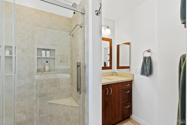 bathroom featuring vanity and walk in shower