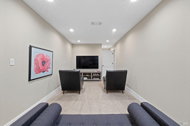 living room with baseboards, carpet flooring, visible vents, and recessed lighting