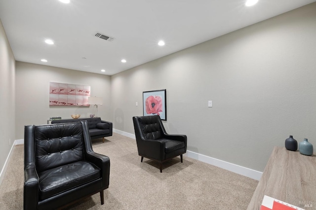 sitting room with carpet flooring, baseboards, visible vents, and recessed lighting