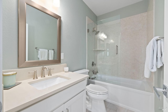 bathroom with shower / bathtub combination, vanity, and toilet