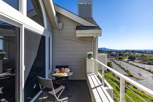 balcony featuring a mountain view