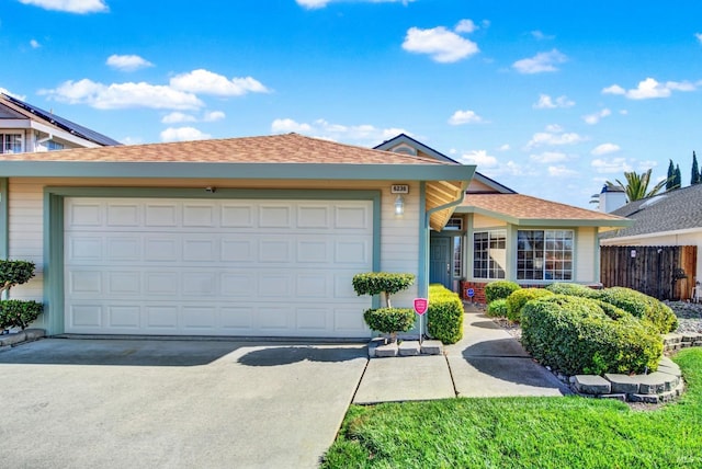 single story home with a garage