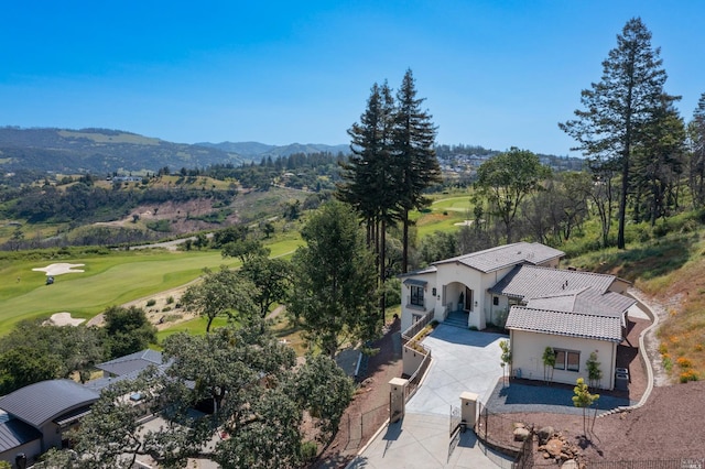 birds eye view of property featuring a mountain view