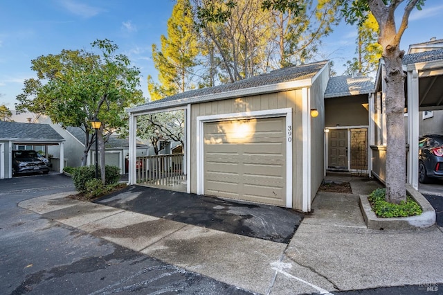 garage with a carport