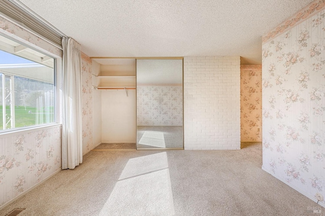 interior space with a textured ceiling