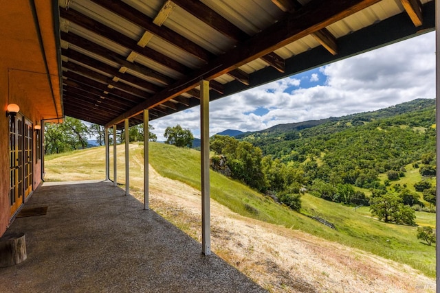 view of patio / terrace with a mountain view