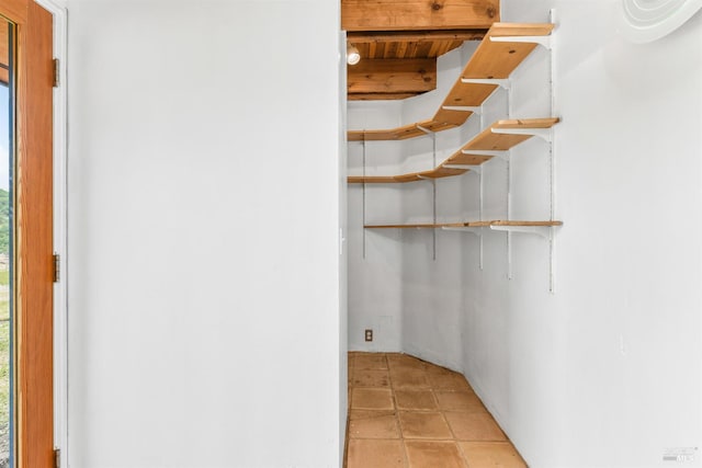 interior space featuring light tile patterned floors