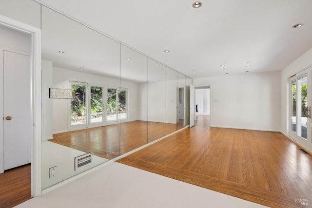 interior space with hardwood / wood-style flooring