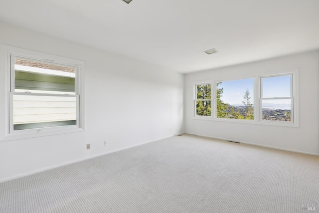 spare room with carpet flooring