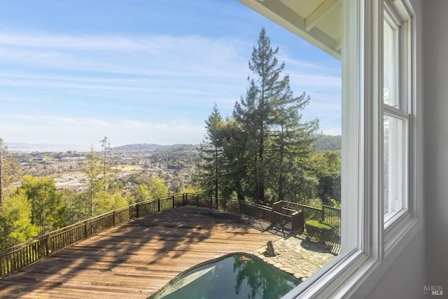 view of swimming pool featuring a mountain view