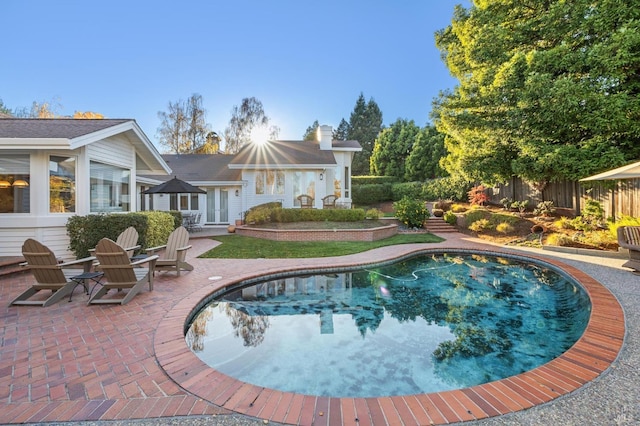 view of pool featuring a patio area