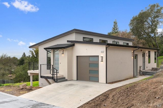 modern home featuring a garage