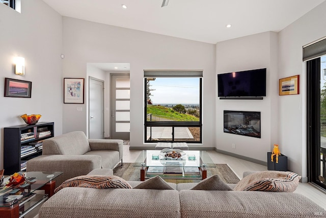 living room featuring vaulted ceiling