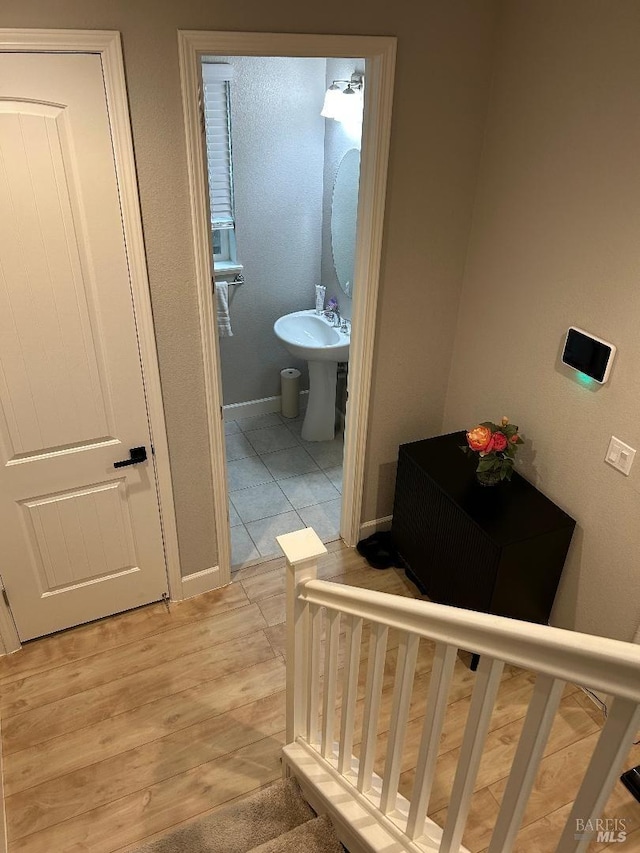 interior space featuring wood-type flooring and sink