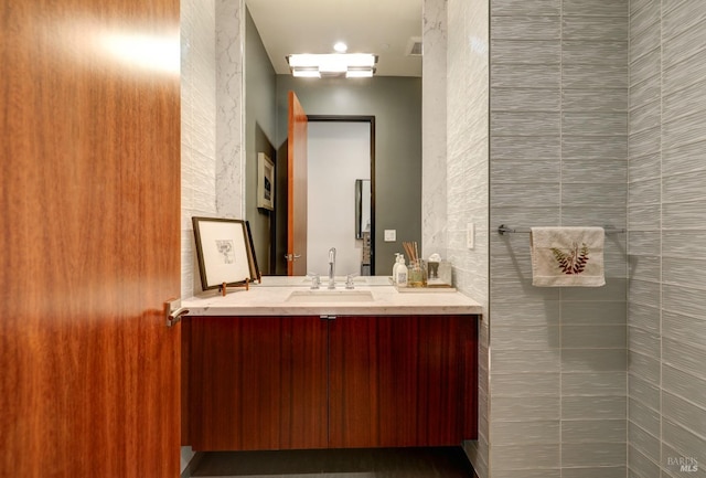 bathroom featuring visible vents and vanity