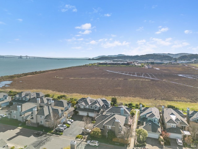 bird's eye view featuring a water and mountain view