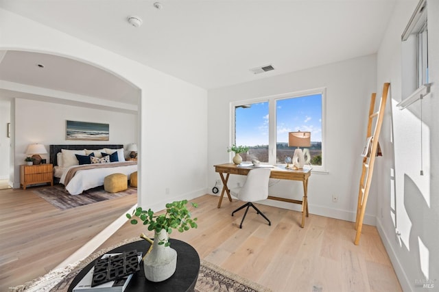 bedroom with light hardwood / wood-style flooring