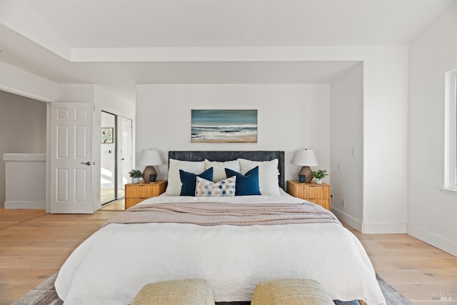 bedroom with wood-type flooring