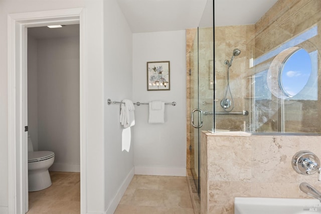 bathroom featuring tile patterned flooring, an enclosed shower, and toilet