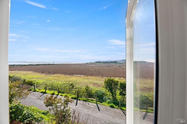 view of water feature with a rural view